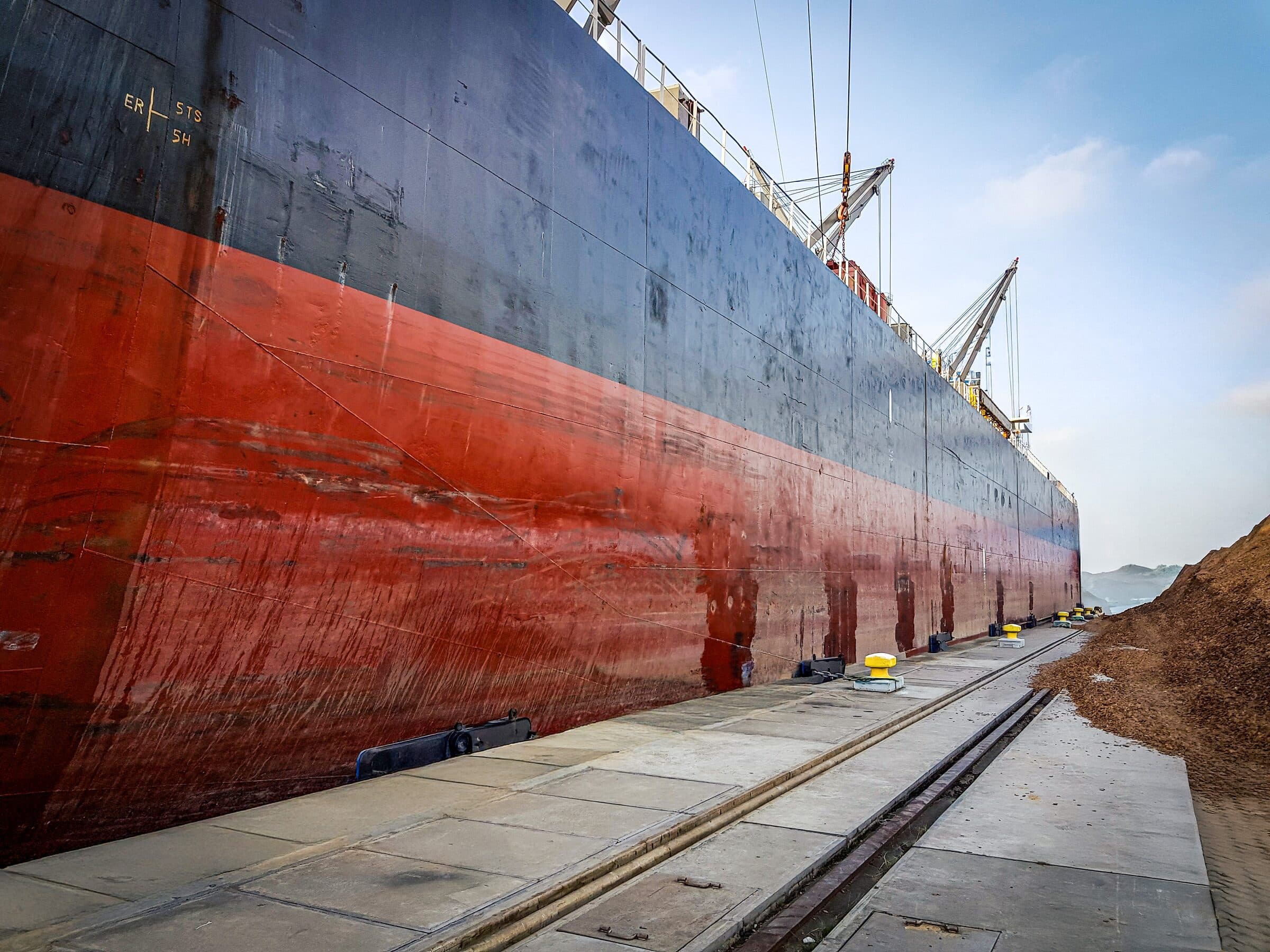 Woodchip vessel alongside at port
